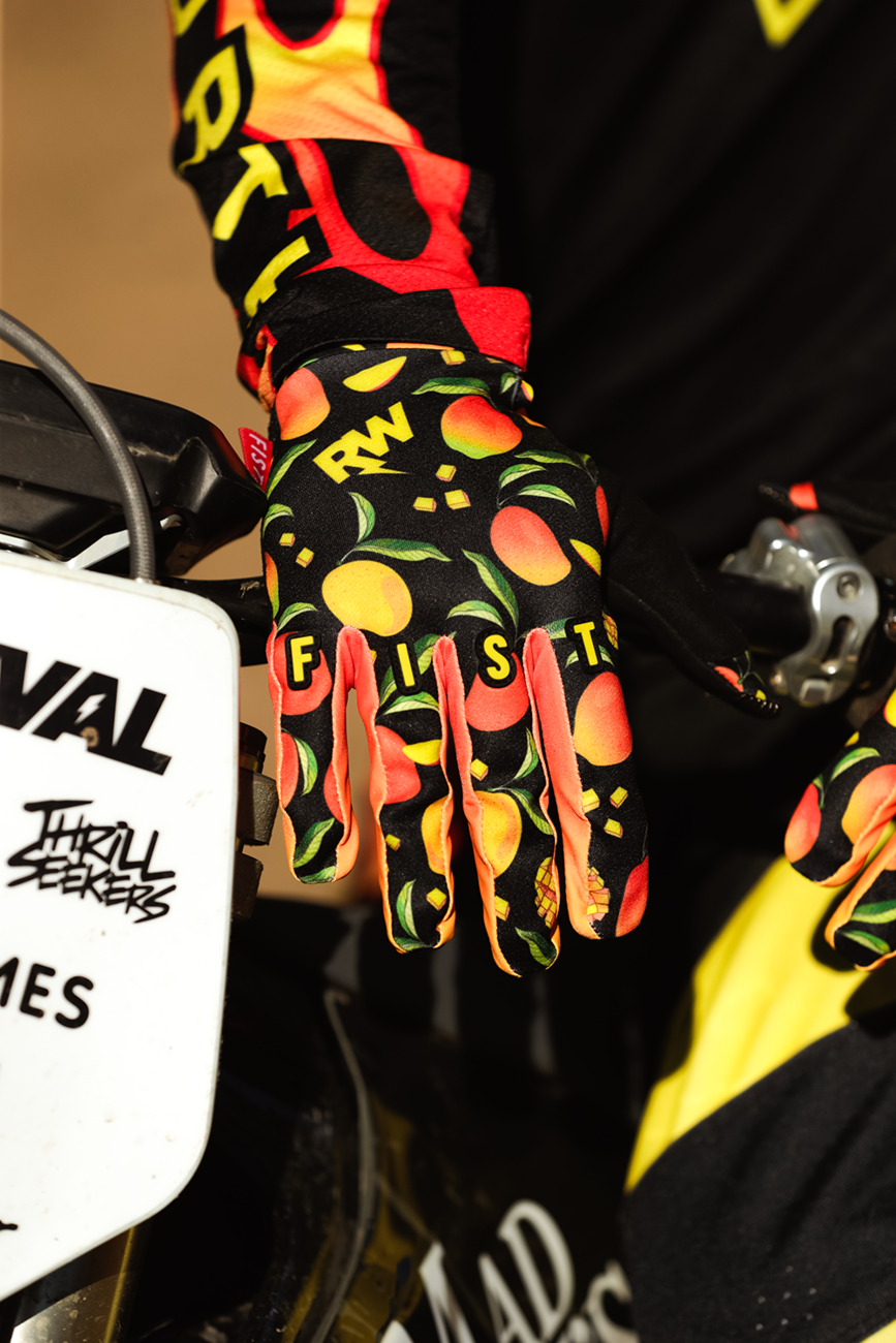 FIST Handwear strapped R-Willy Mango Madness gloves in red, XS size, with adjustable straps and vibrant red color.