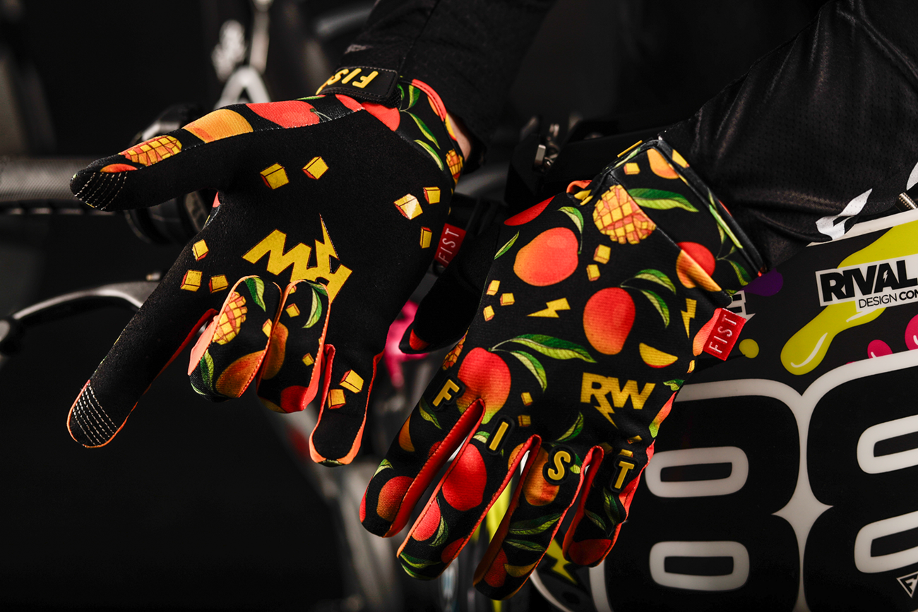 FIST Handwear R-Willy Red Label Mango Madness gloves in red, size XS, with leather straps and bold design.