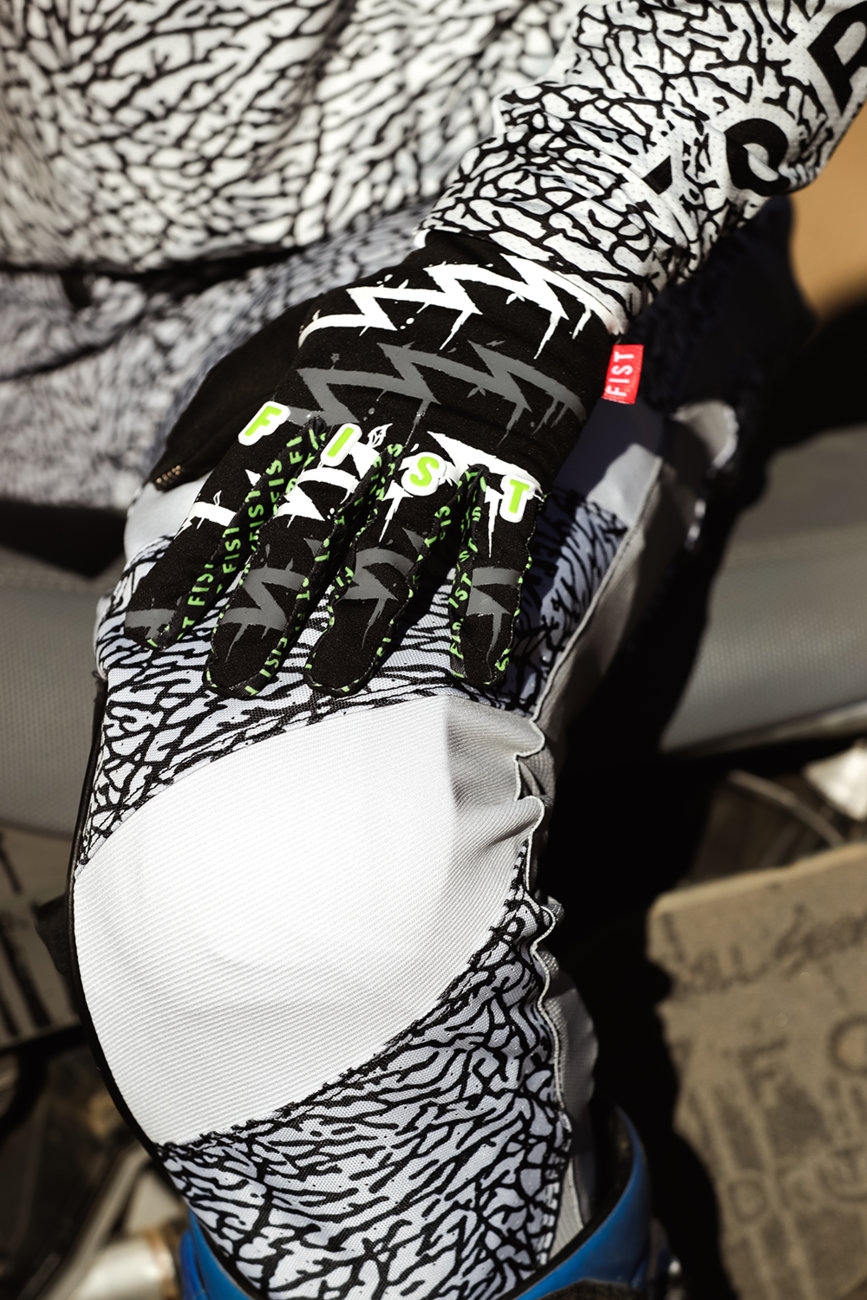 FIST Handwear Taka Higashino Cali Roll Gloves in size XS with black straps and colorful design, designed for martial arts or training.