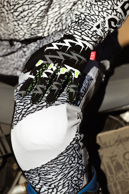 FIST Handwear Taka Higashino Cali Roll Gloves in size XS with black straps and colorful design, designed for martial arts or training.