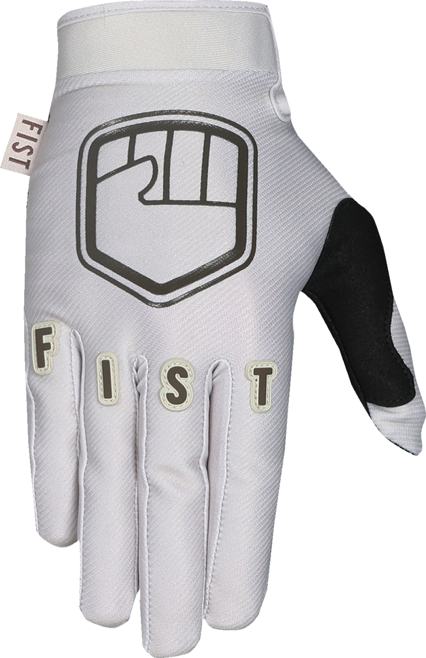 FIST Handwear strapped Earth Stocker gloves in bone color, small size, showing durable leather straps and rugged design.