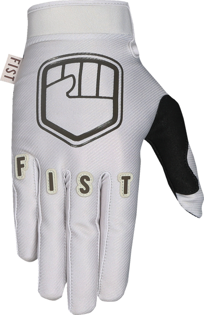 FIST Handwear strapped Earth Stocker gloves in bone color, small size, showing durable leather straps and rugged design.