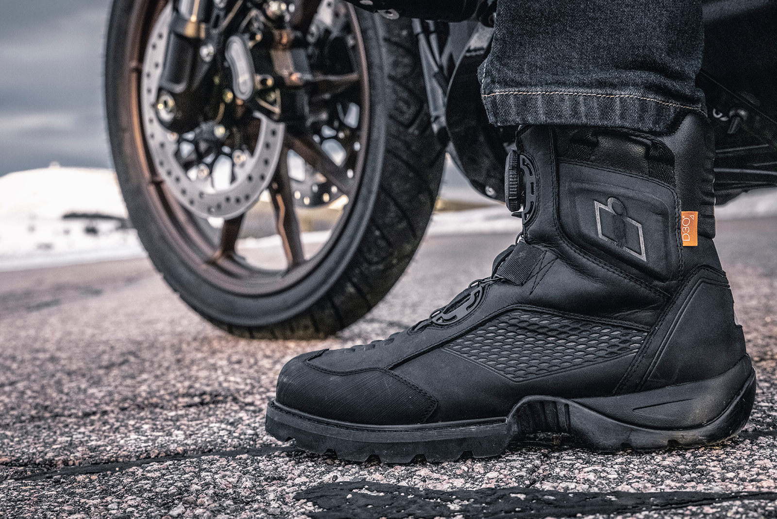 Black ICON Stormhawk boots by Bill's Exhausts, size 8.5, with rugged design and sturdy sole visible.