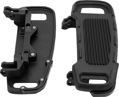 Black adjustable width floorboards for motorcycle from DRAG SPECIALTIES, featuring a sleek design and durable construction.