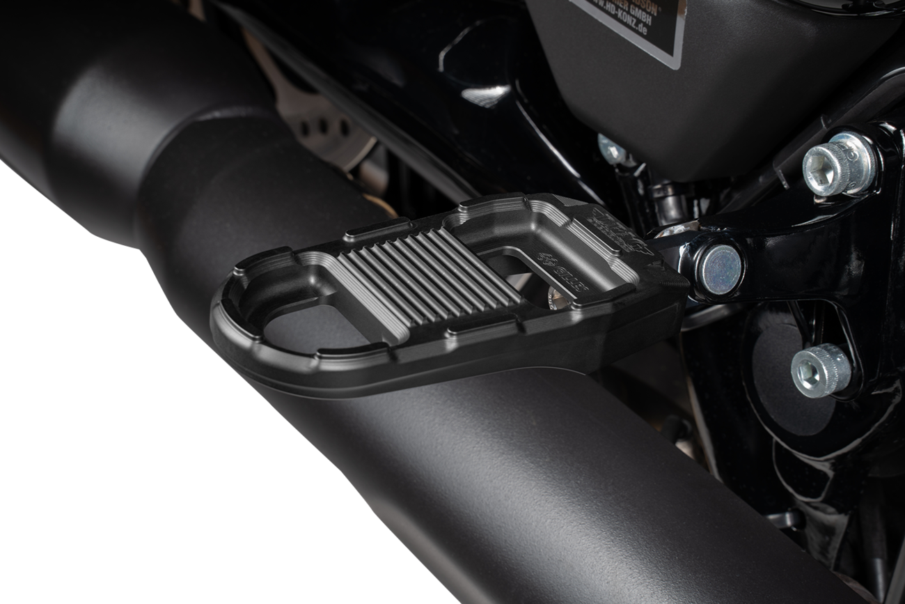 Black DRAG SPECIALTIES adjustable motorcycle foot pegs with mounting hardware for enhanced rider comfort and control.