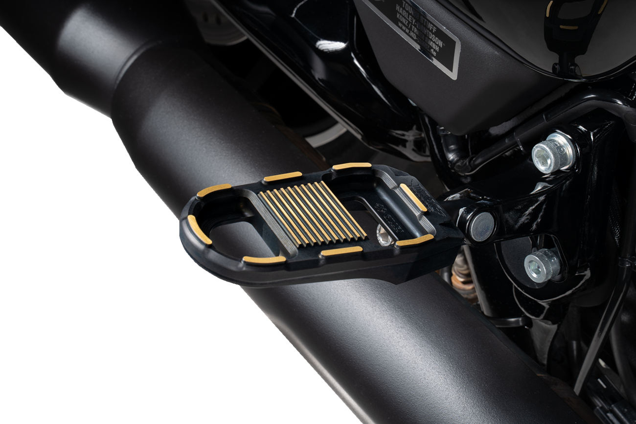 Black and gold DRAG SPECIALTIES adjustable motorcycle foot pegs with mounting hardware, designed for custom bike upgrades.