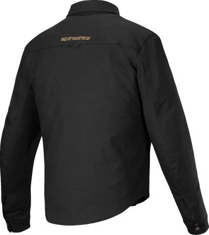 Alpinestars Bryon WR water-resistant overshirt in black, medium size, displayed on a hanger with visible fabric texture and design.