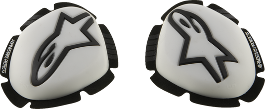 Alpinestars GP Plus Knee Sliders in white and black with protective rubber surface, designed for motorcycle riding.