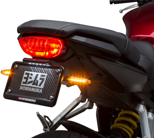 YOSHIMURA Fender Eliminator Kit for Honda motorcycle, showing sleek black tail tidy with mounting hardware and LED light assembly.