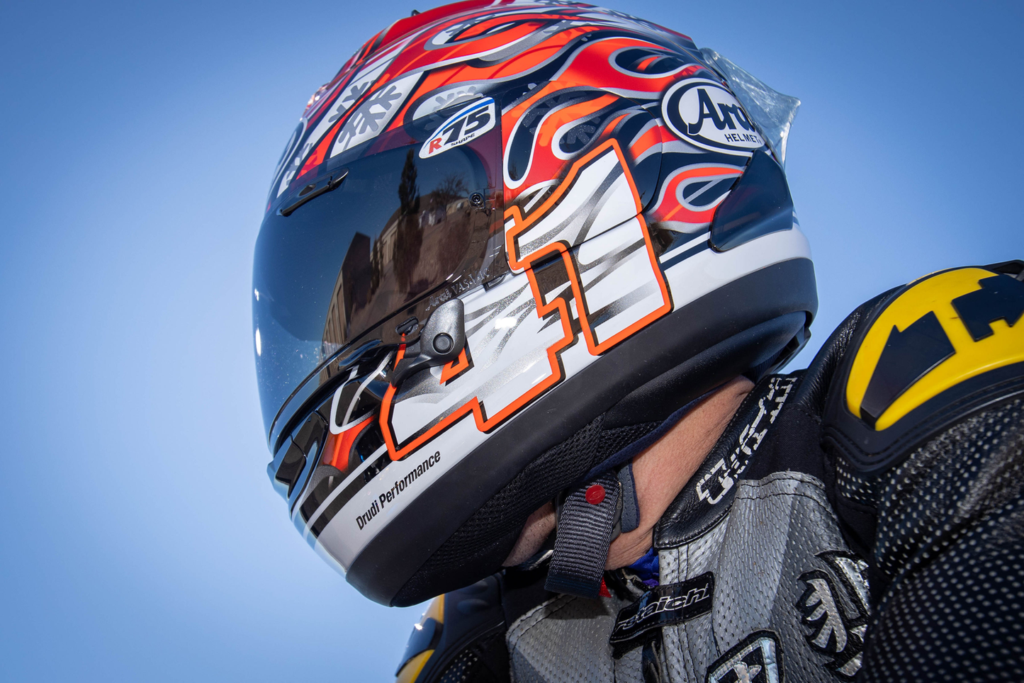 Arai Corsair-X Haga GP motorcycle helmet in XS size with a sleek design and clear visor, showcasing the Arai Helmets brand.