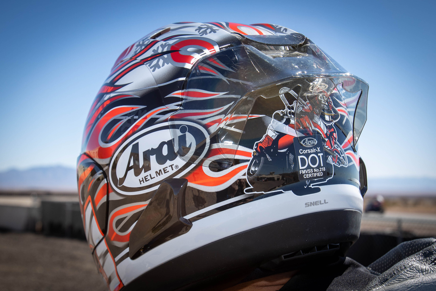 Arai Corsair-X Haga GP motorcycle helmet in XS size with bold black and white design, featuring aerodynamic vents and visor.