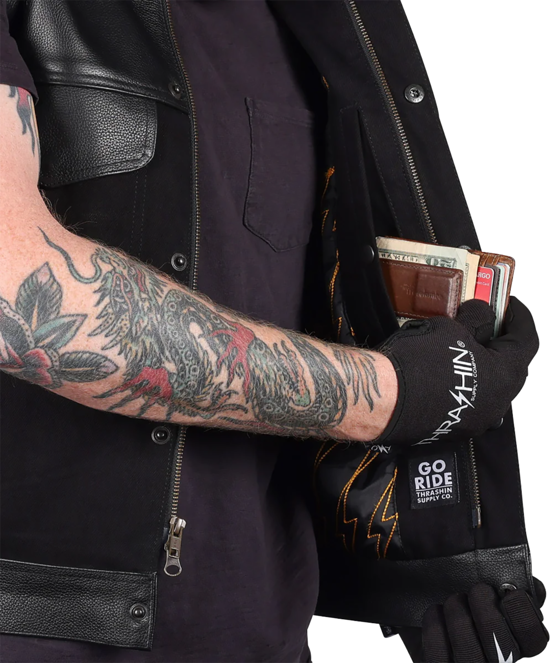 Black Kanan leather and denim riding vest by THRASHIN SUPPLY CO., size medium, featuring rugged design and metal hardware details.