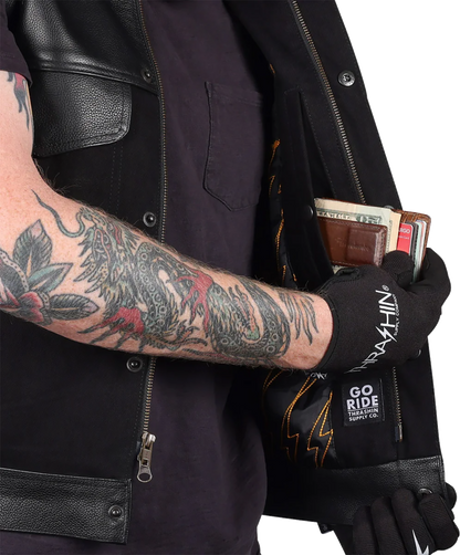 Black Kanan leather and denim riding vest by THRASHIN SUPPLY CO., size medium, featuring rugged design and metal hardware details.