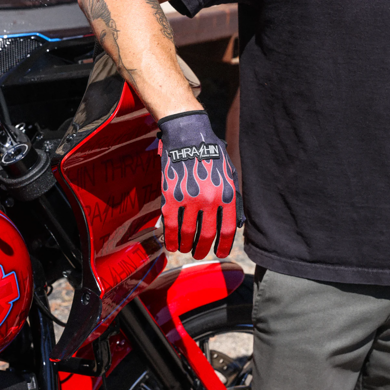 Red THRASHIN SUPPLY CO. Stealth Leather Palm Flame Gloves in 2XL size, showing the flame design and leather material.