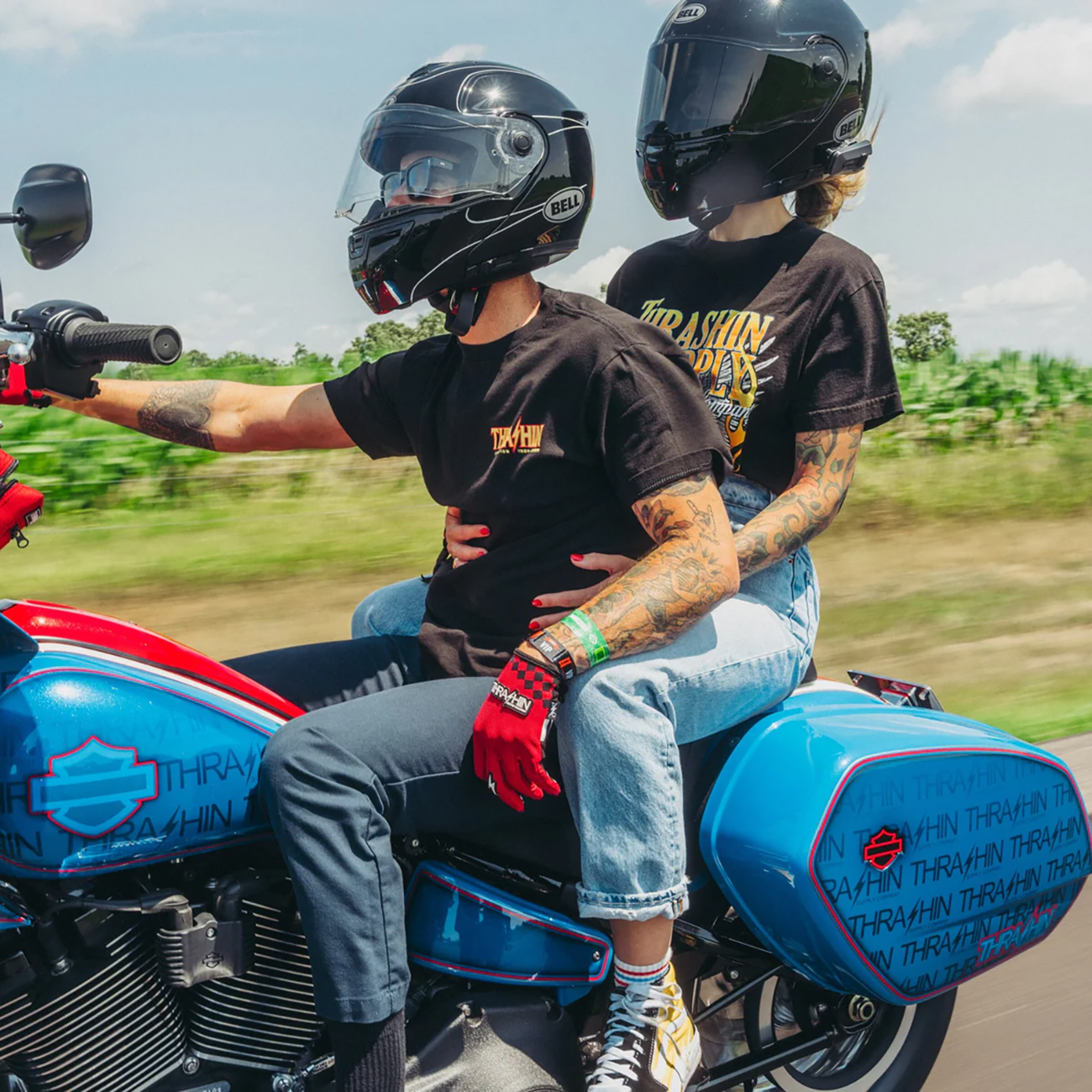 Red medium THRASHIN SUPPLY CO. Go Fast Stealth gloves with black accents, designed for racing or riding.