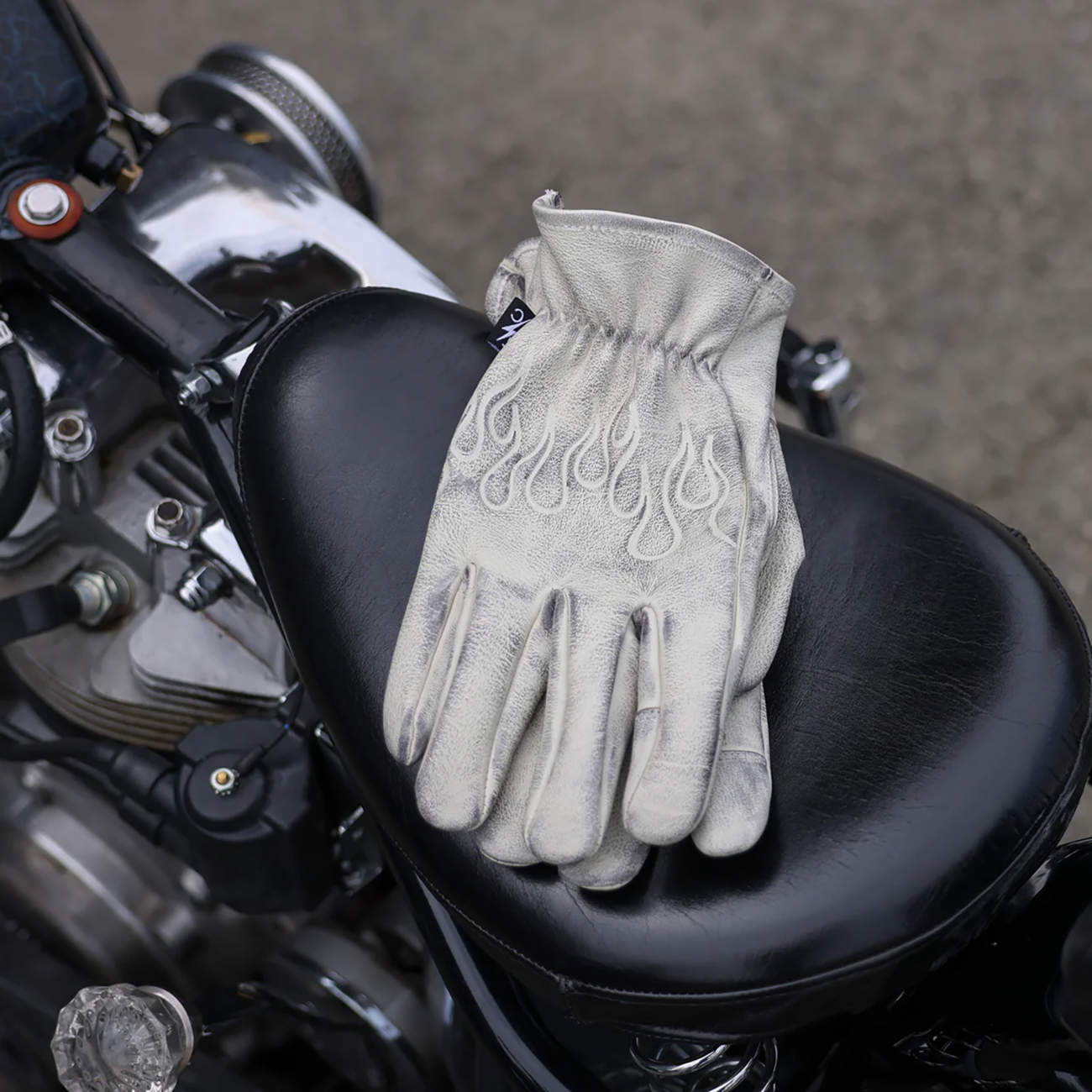 Bone white Roper leather gloves by THRASHIN SUPPLY CO. in medium size, showing detailed stitching and soft leather texture.