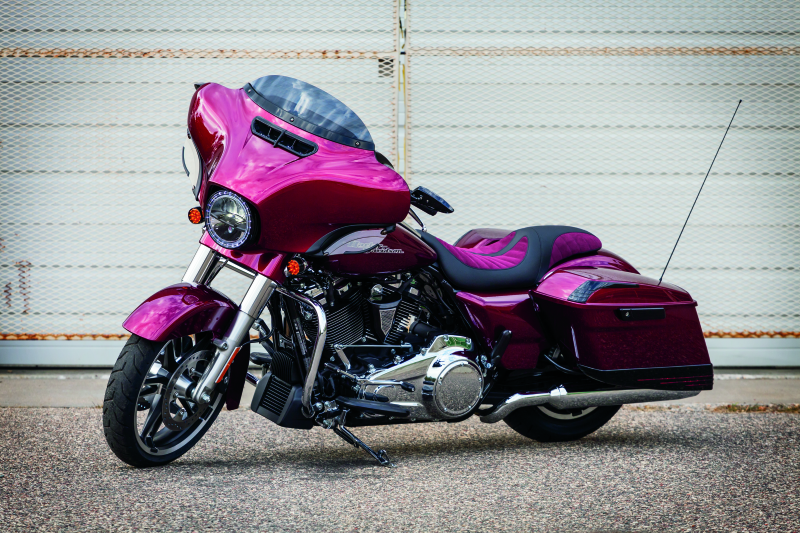 Kuryakyn Smooth Windshield Trim for Harley Davidson Touring motorcycles, showcasing shiny chrome finish and sleek design.