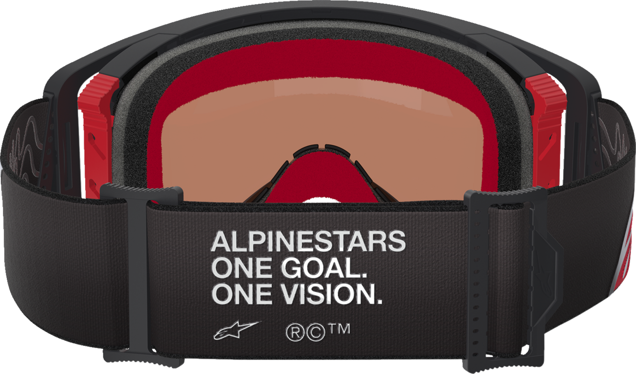 Alpinestars Supertech goggles with silver mirror lens, black and red frame, designed for motorsports and racing.
