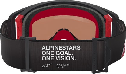 Alpinestars Supertech goggles with silver mirror lens, black and red frame, designed for motorsports and racing.