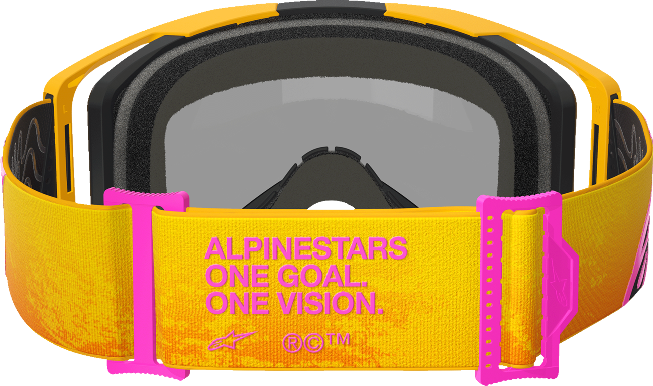 Alpinestars Vision 8 goggles with orange, yellow, and pink frame and gold mirror lens, designed for motocross or racing.