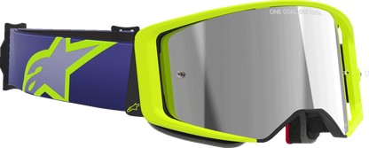 Alpinestars GOGGLES Supertech goggles with purple/yellow frame and silver mirror lens, designed for motorcycling or racing.