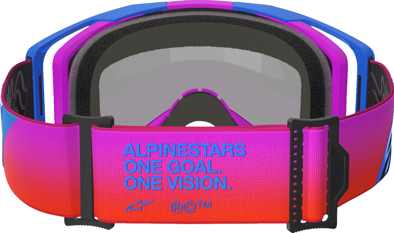 Alpinestars GOGGLES Vision 8 with blue, purple, and orange frame and red mirror lens for motocross and off-road riding.