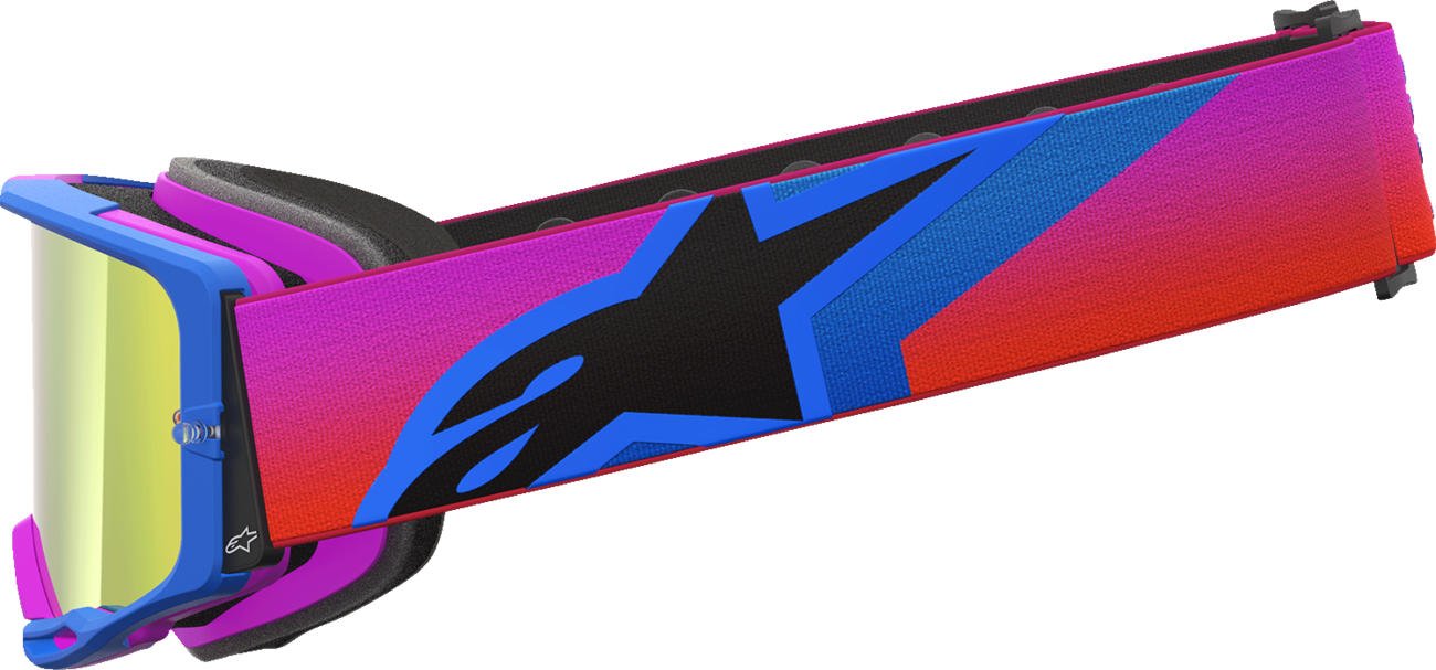 Alpinestars Vision 8 goggles with blue, purple, orange frame and red mirror lens, designed for motocross or off-road riding.