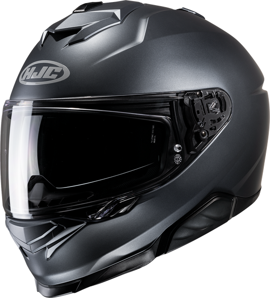 HJC i71 helmet in solid semi-flat anthracite color, showing the sleek design and secure fit for motorcycle riding.