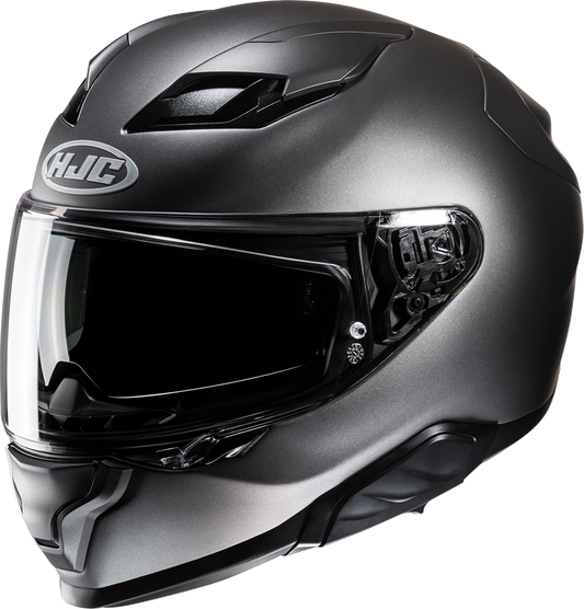 HJC F71 helmet in solid semi-flat black titanium with smart Bluetooth system, size XS, featuring sleek design and integrated communication tech.