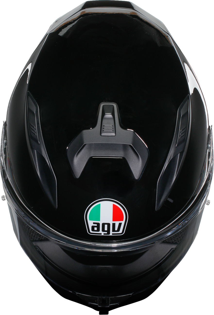 AGV K7 helmet in gloss black, small size, featuring aerodynamic design and ventilation for motorcycle riding comfort.