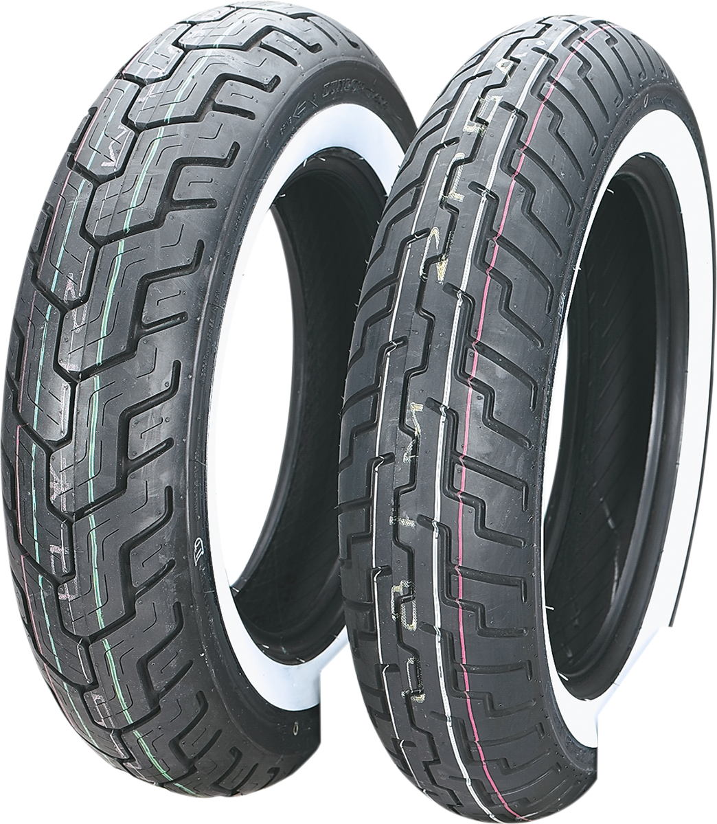 Dunlop D404 front motorcycle tire with 150/80-16 wide whitewall and 71H load rating on a motorcycle wheel.