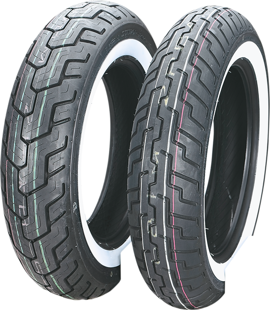 Dunlop D404 front motorcycle tire with 150/80-16 wide whitewall and 71H load rating on a motorcycle wheel.