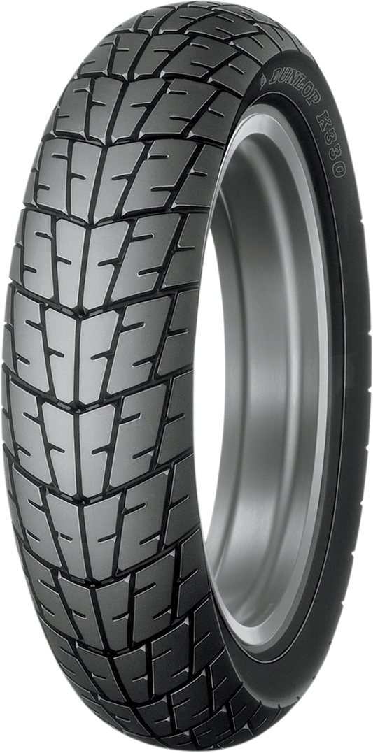 Dunlop K330 front motorcycle tire 100/80-16 50S shown on a motorcycle wheel with tread pattern visible
