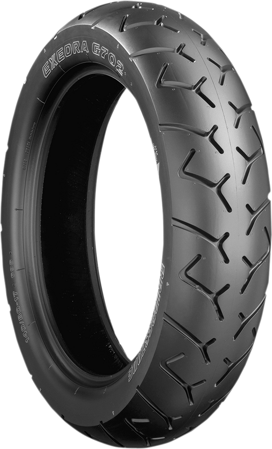 BRIDGESTONE Exedra G702-G rear motorcycle tire 150/90B15 designed for touring bikes, featuring durable tread and rugged sidewalls.