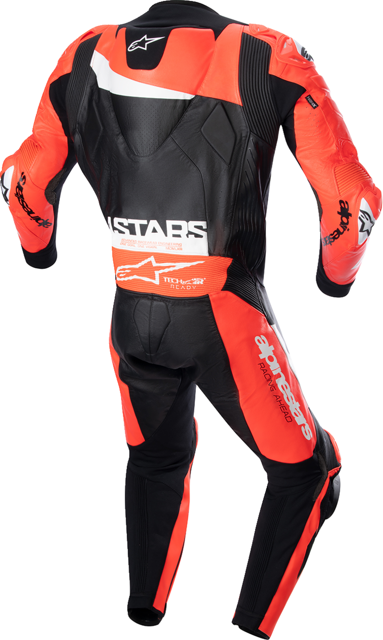 Alpinestars GP Plus v4 black, red fluo, and white leather motorcycle suit, US 44 / EU 54, with detailed stitching and armor.