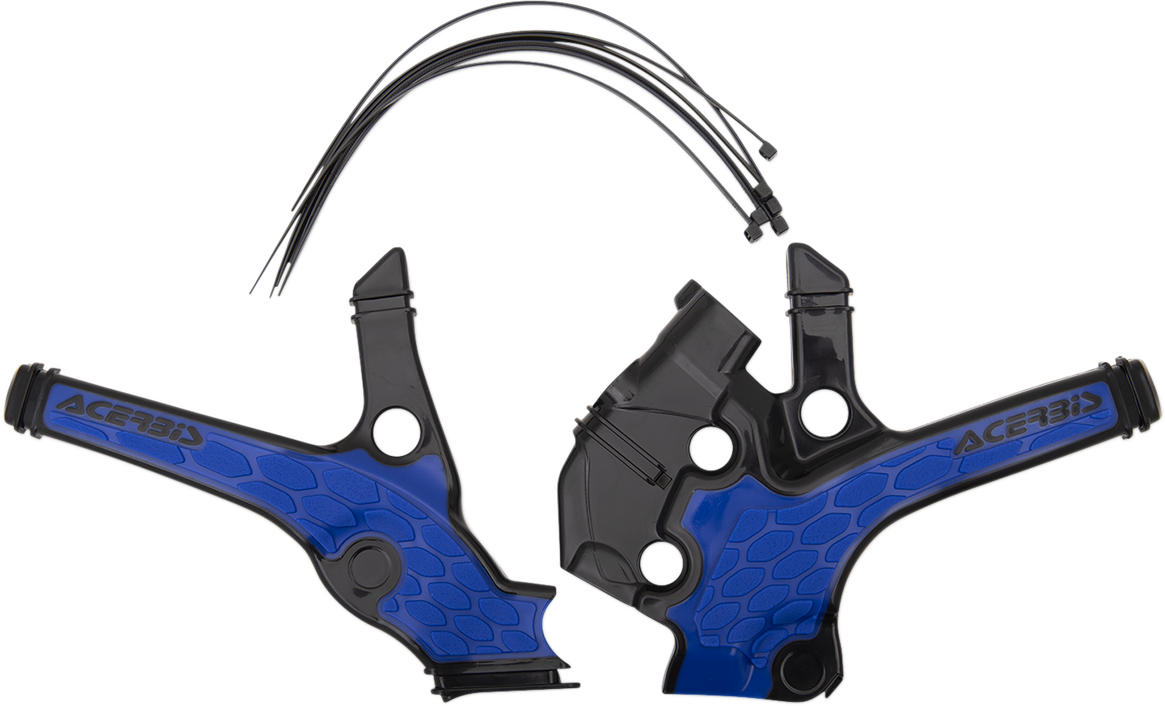A set of Acerbis X-Grip black and blue motorcycle frame guards installed on a bike's body, showing detailed close-up of the protective covers.