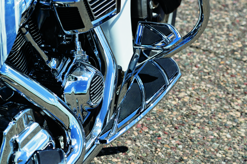 Chrome Kuryakyn Phantom Brake Pedal Pad for Harley Davidson FL Touring models, featuring a sleek, textured design.