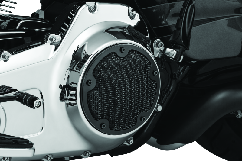 Kuryakyn Mesh Derby Cover in black for Harley-Davidson Touring models, showcasing the stylish motorcycle engine cover.
