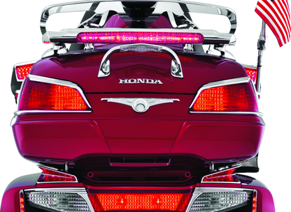 Kuryakyn LED lighted trunk lid handle for Honda Gold Wing GL1800 (2001-2005) motorcycle, featuring illuminated design and sturdy grip