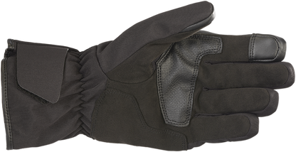 Black Alpinestars Tourer W-6 Drystar gloves in medium size, showing textured leather and protective knuckle guards.