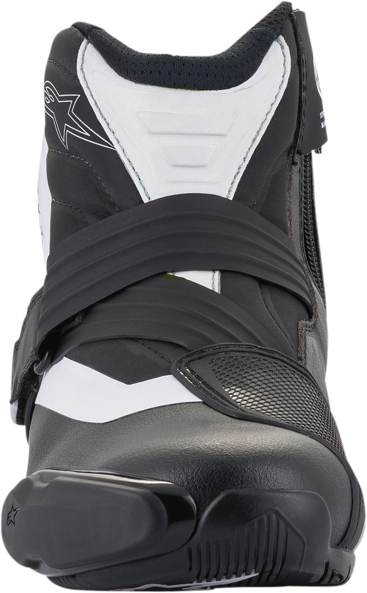 Alpinestars SMX-1 R v2 motorcycle boots in black and white, US 8 / EU 42, with protective design and adjustable closures.