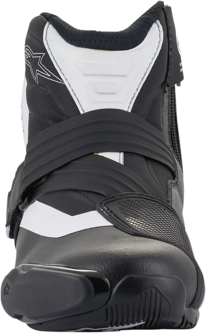 Alpinestars SMX-1 R v2 motorcycle boots in black and white, US 8 / EU 42, with protective design and adjustable closures.