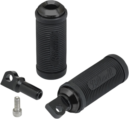 Black BILTWELL Norman Foot Pegs for motorcycle, showing metal body with mounting points and textured footrest surfaces.
