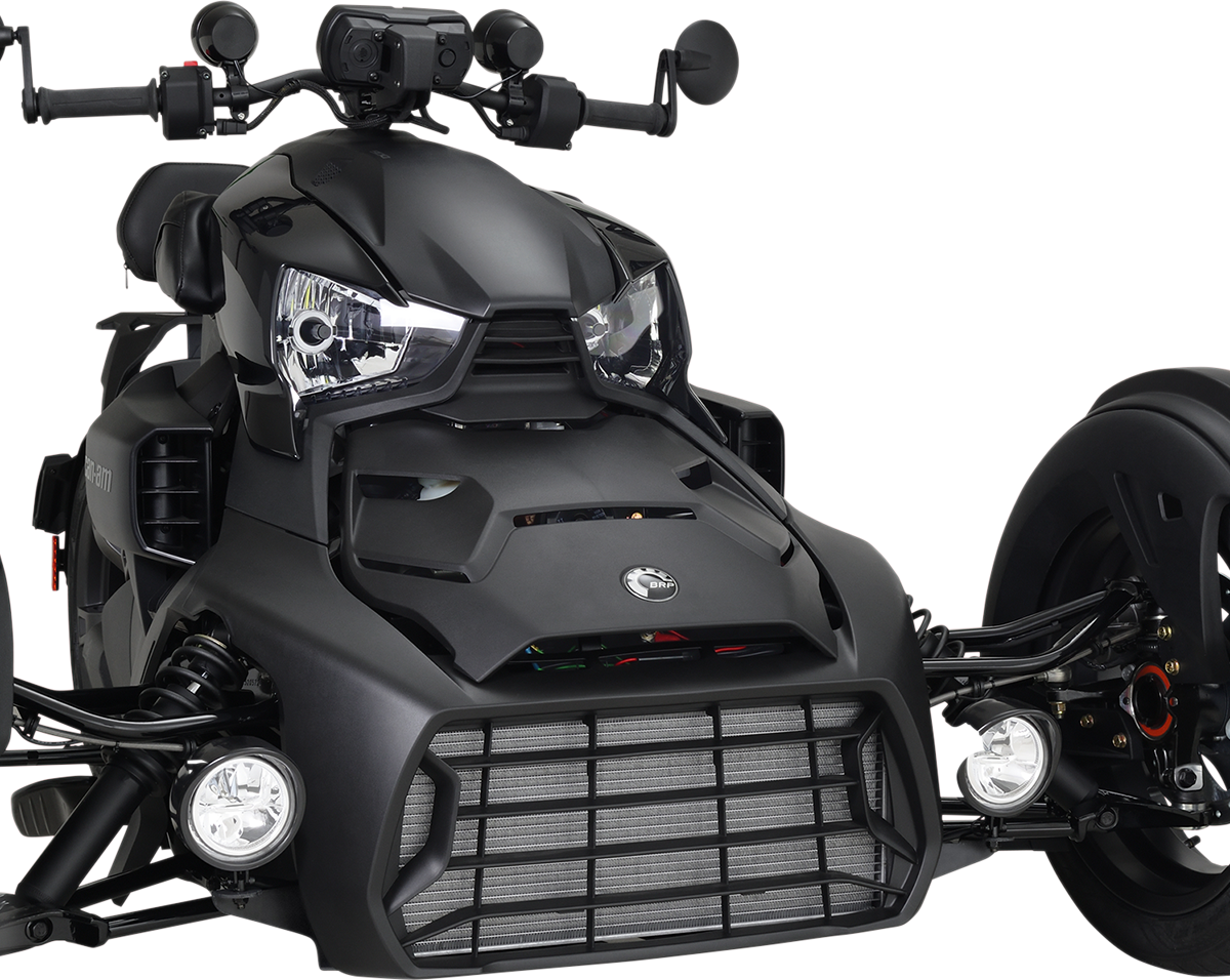 Black SHOW CHROME LED Driving Light Kit for Ryker, installed on engine, with sleek black finish for enhanced visibility and style.