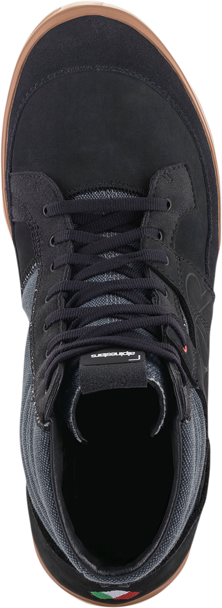 Black Alpinestars Grange shoes in US 10.5 with sleek design and textured sole, displayed on a plain background.