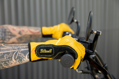 BILTWELL Borrego Gloves in Gold and Black, large size, motorcycle riding gloves with stylish design and protective features.