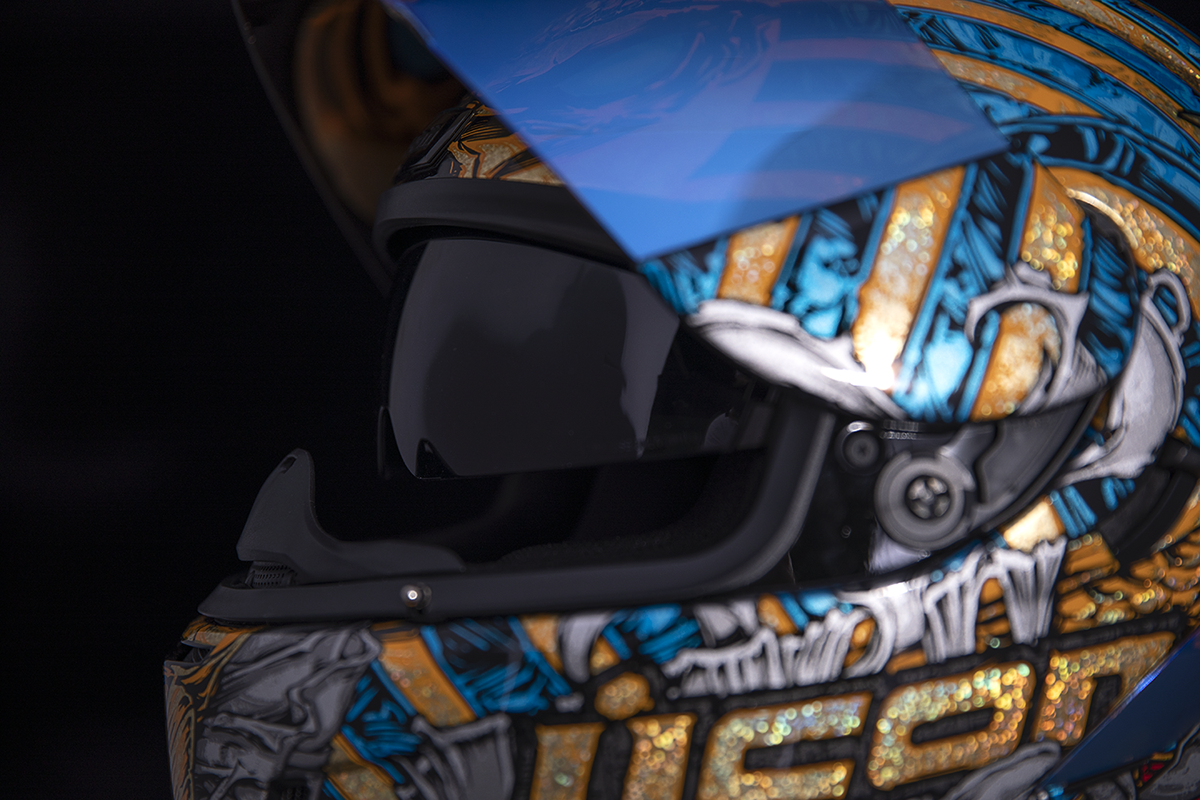 Gold ICON Airform™ Pharaoh helmet in XL size, featuring a sleek, aerodynamic design with detailed branding and finishing.