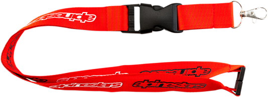Red Alpinestars Core lanyard, protective gear with branding, featuring a durable design and secure attachment points.