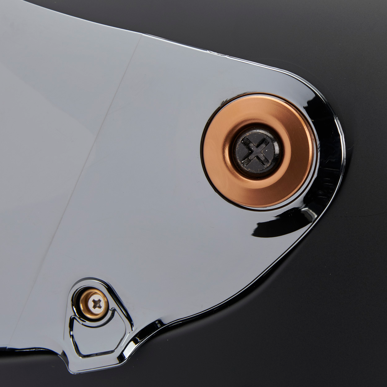 Black BILTWELL Gen 2 hardware screw with bronze baseplate for helmets, designed for secure fitting and durability.