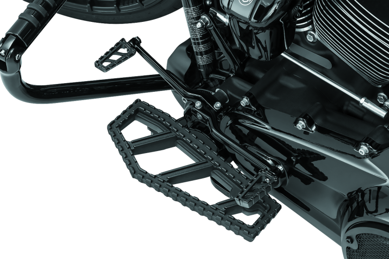 Kuryakyn Riot Floorboards for Harley Davidson in satin black with textured surface and mounting hardware.
